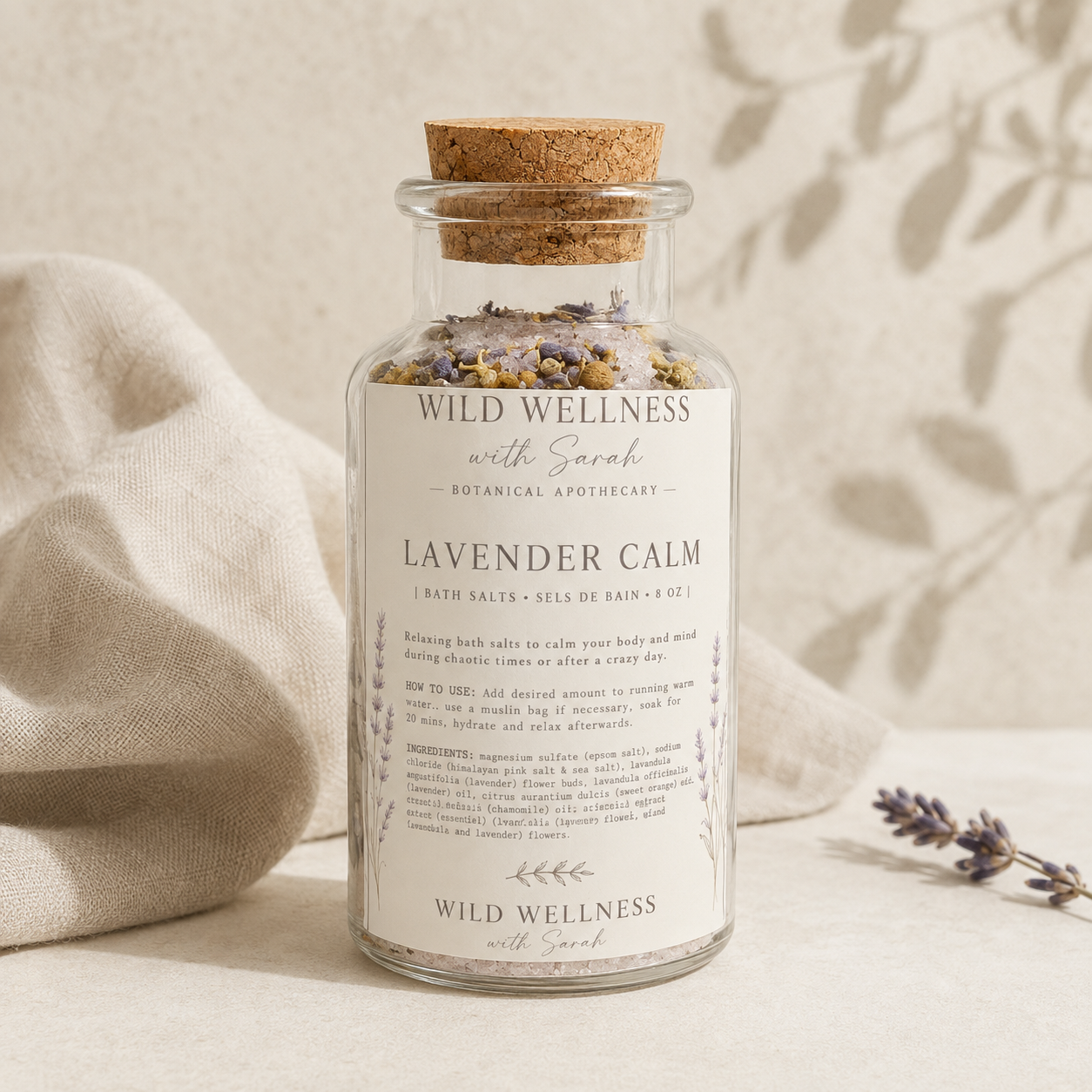 Wild Wellness Lavender Calm bath salts in a glass apothecary bottle