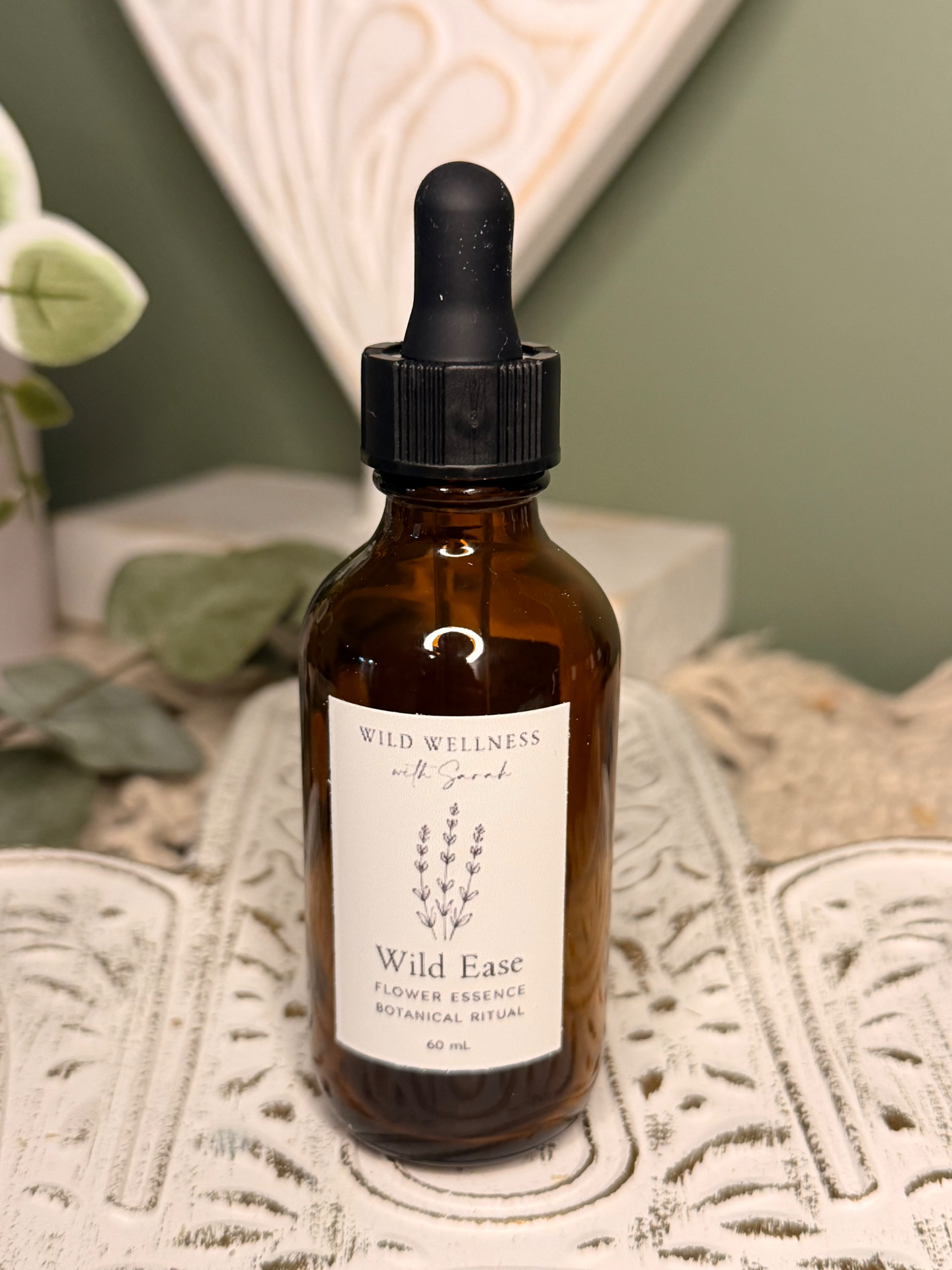 Wild Ease flower essence in amber glass dropper bottle
